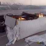 A truck full of batteries has been burning for almost a full day, shutting down ports in LA