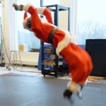 Watch Boston Dynamics’ Atlas robot do a backflip in a Santa suit