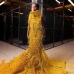 ‘Somewhat robot, somewhat human’: designer used 12,000ft fiber optic cable to weave a striking 50lb dress that will turn heads – and no, you can’t buy it